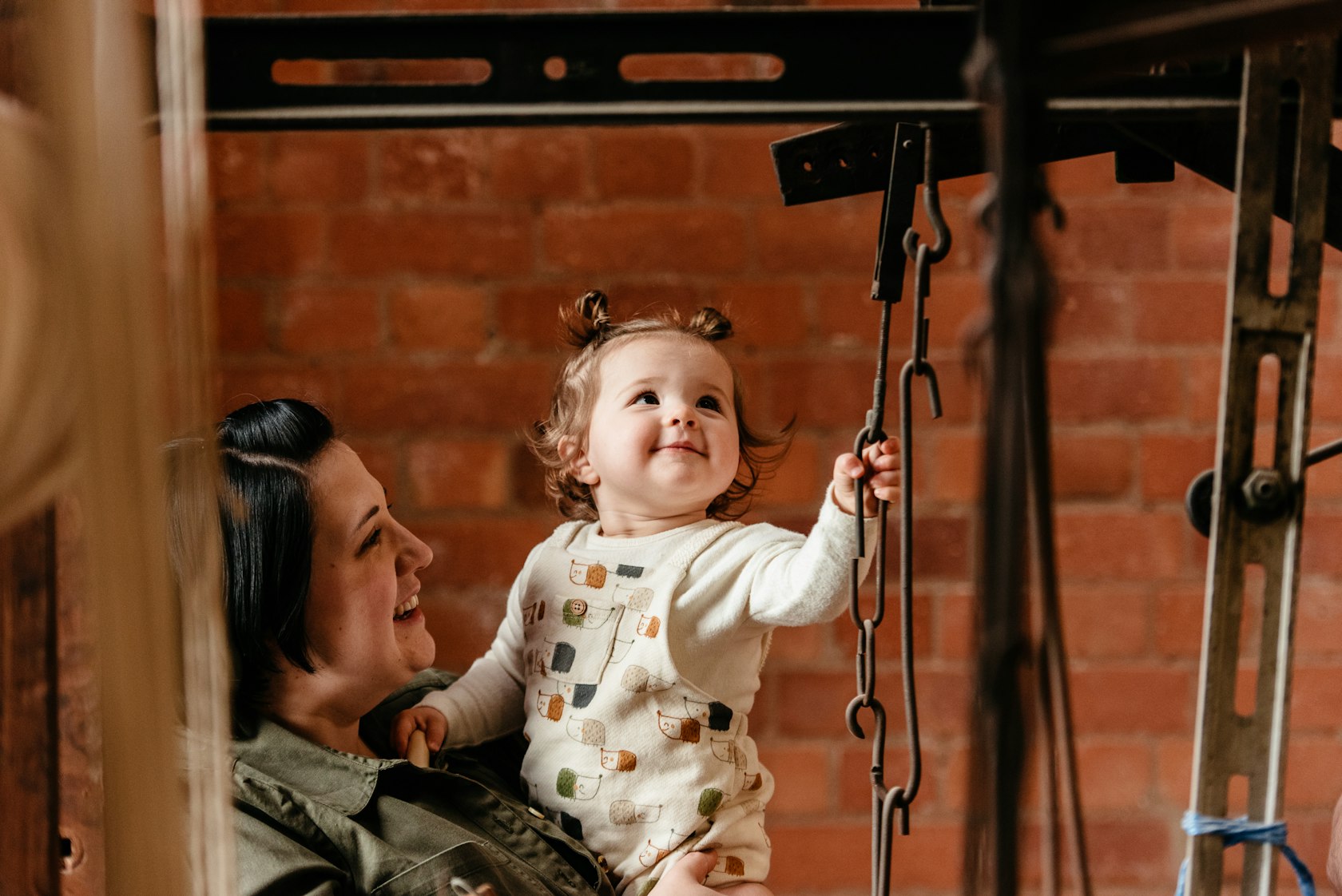 A young visitor explores a loom on display in The Gateway at the Museum of Making – Chris Seddon Photography-Derby Museums