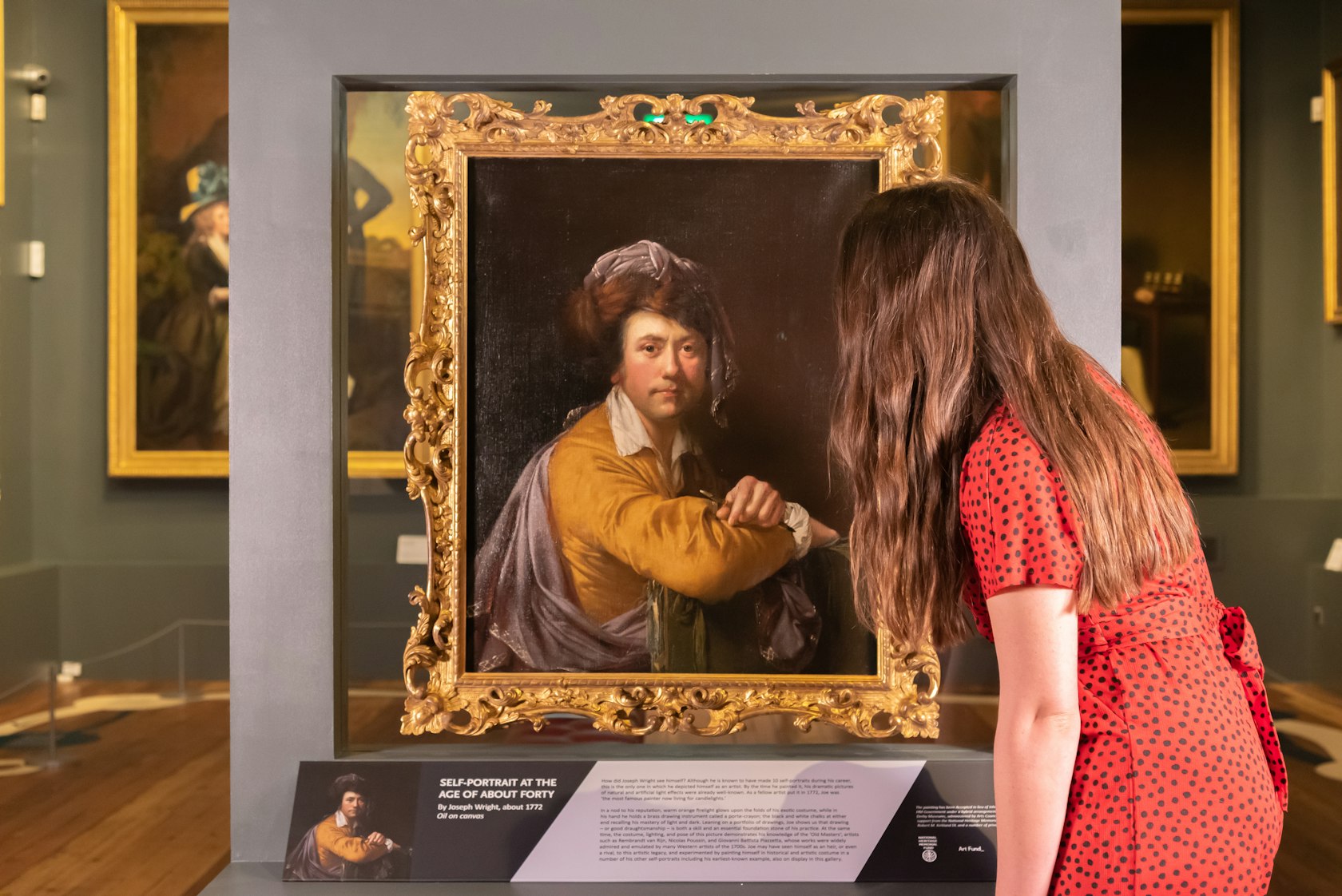 Visitor viewing ‘Self-Portrait at the age of about forty’ by Joseph Wright of Derb